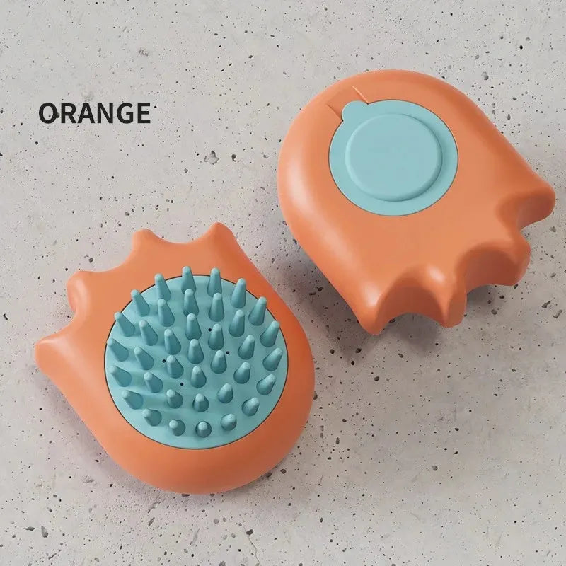 Blue pet bath brush with massage comb bristles and a built-in shampoo box.