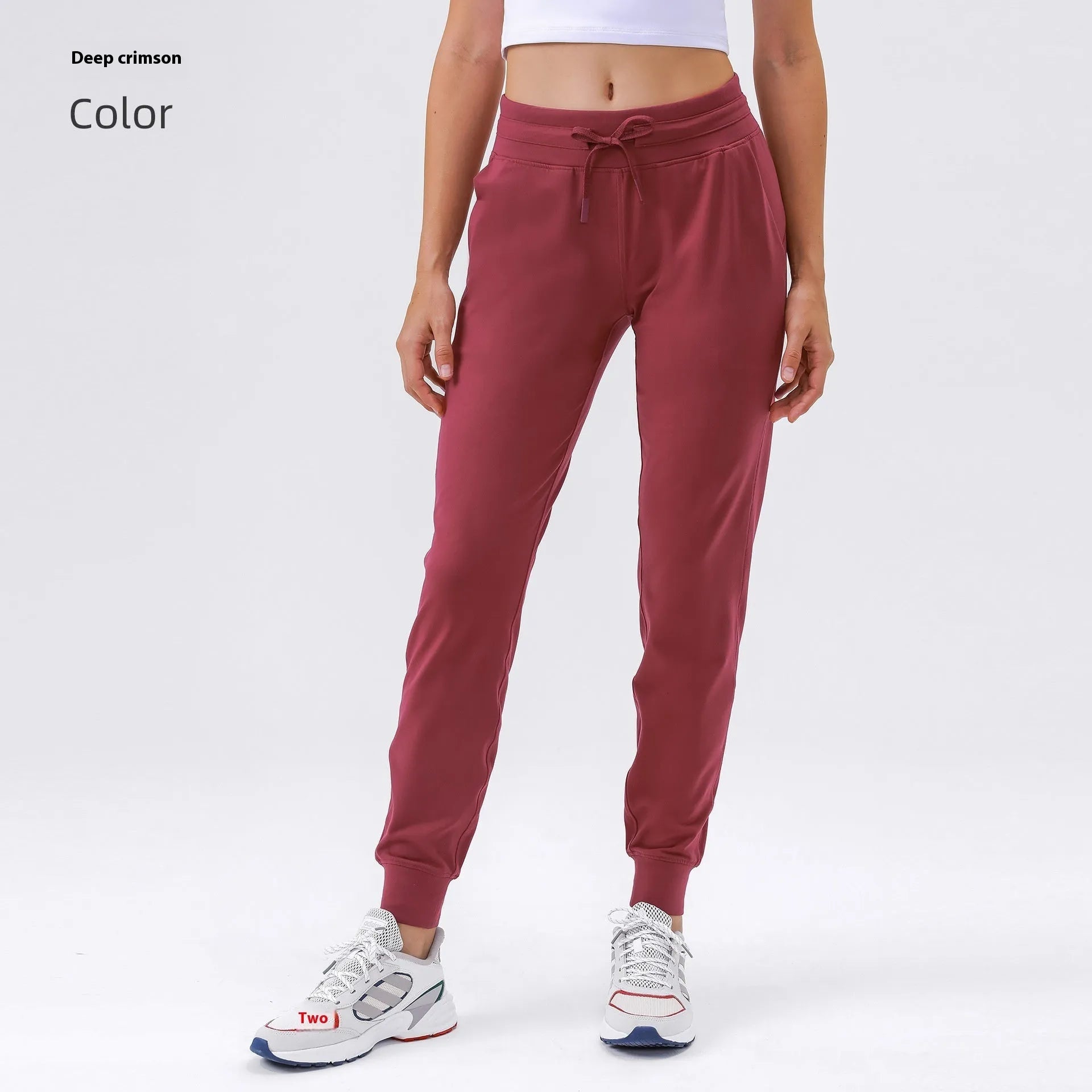 Women's high-waist yoga pants in distilled coffee colour with an elastic drawstring waist for fitness.