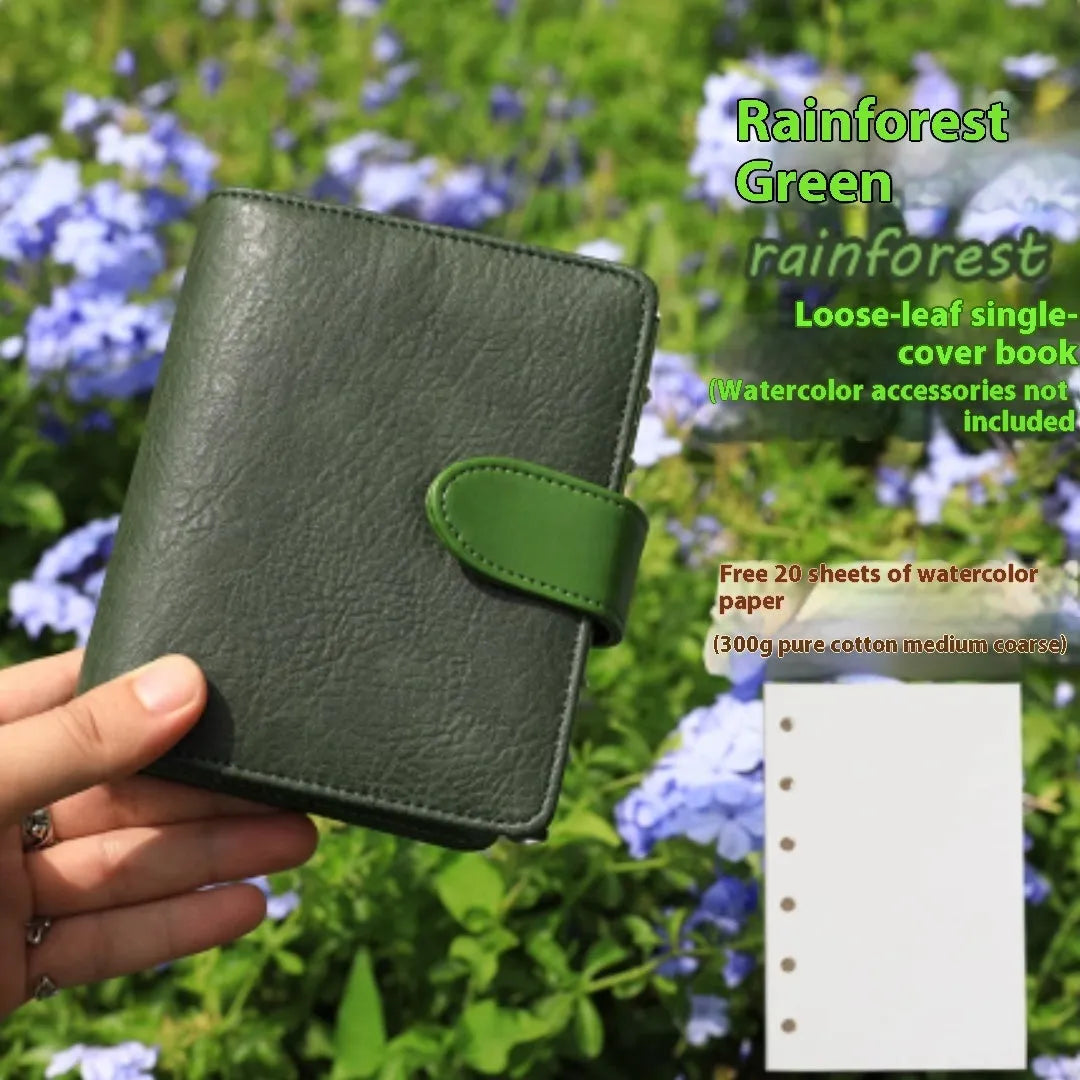 A7 size loose-leaf watercolour notebook in multiple colours, open to show 160gsm paper pages.