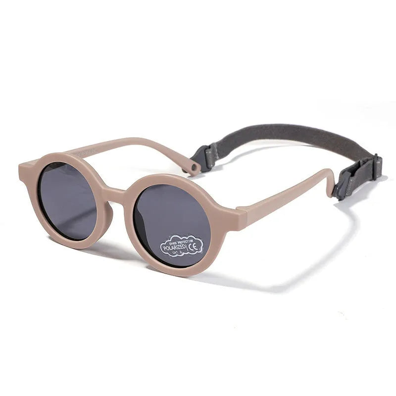 Children's silicone sunglasses with round frames for 0-3 year olds in multiple colour options showing UV400 and polarized protection