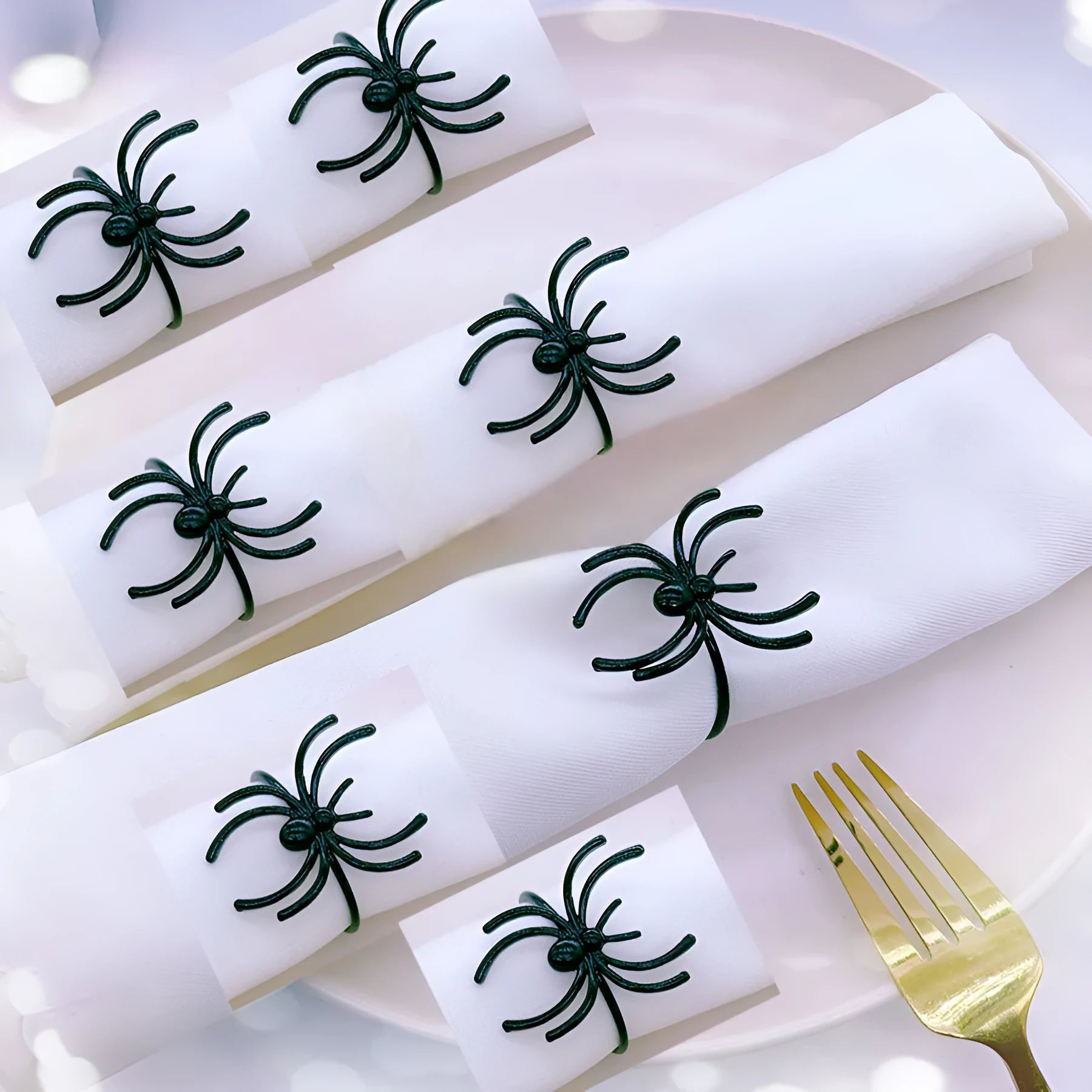Six black spider alloy napkin rings for Halloween table decoration with electroplated finish