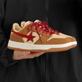 Brown women's platform sneakers with sequin details on PU leather upper and a white rubber sole.
