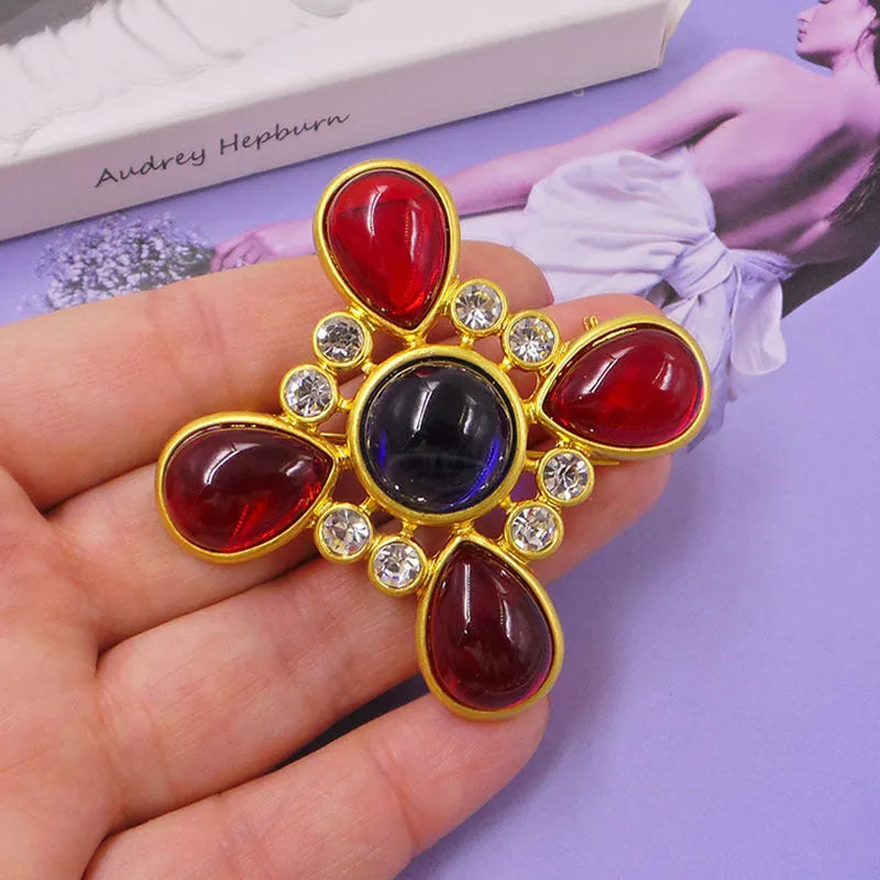 A vintage-style medieval baroque crystal brooch made from zinc alloy, shown in one of eight available colour options.
