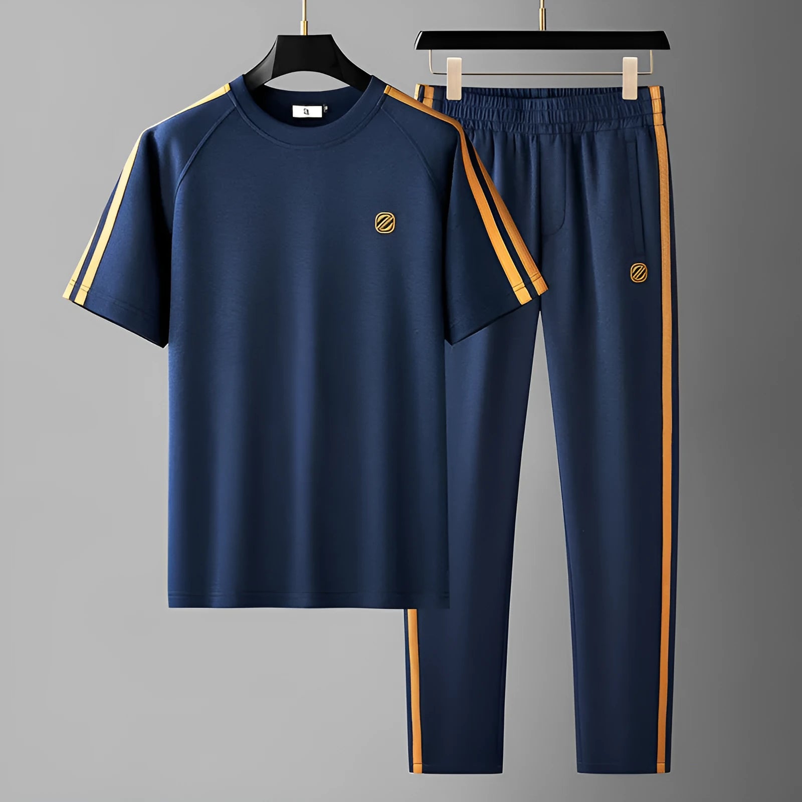 Men's blue short sleeve polyester suit set with matching top and trousers for sports activities