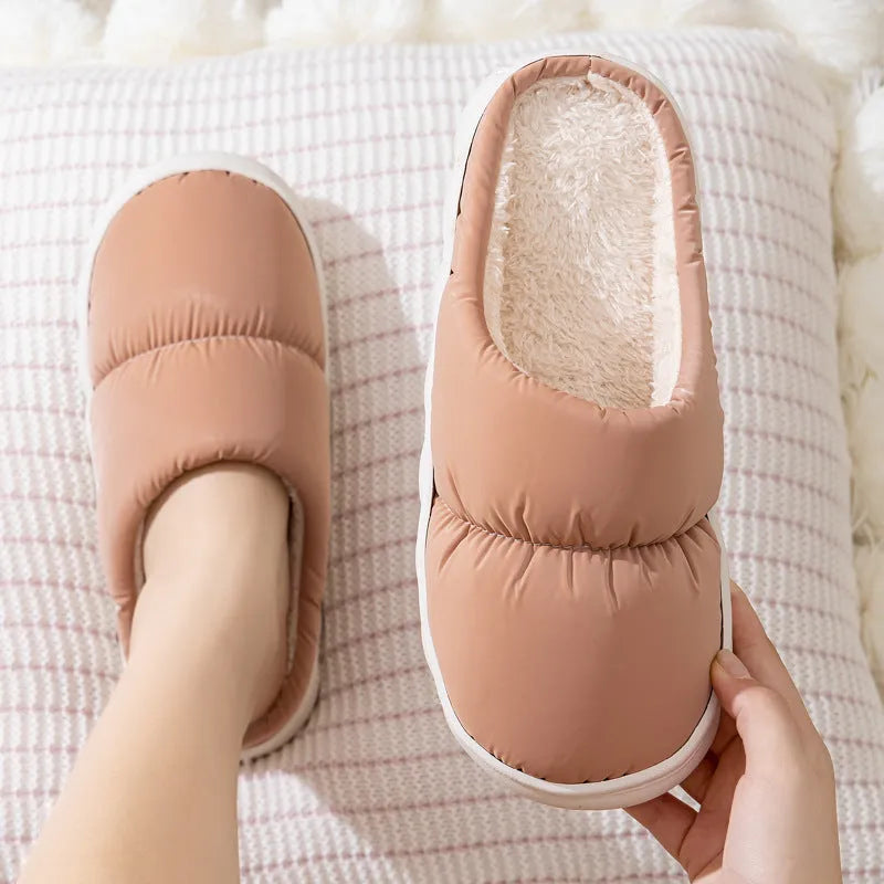 Down cotton couple slippers with artificial leather upper and non-slip rubber soles in multiple colour options