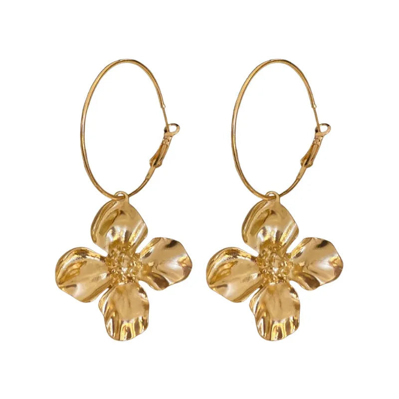 Silver needle metal flower earrings with geometric floral design in gold or silver colour