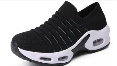 Women's stretch knitted sock shoes in various colours showing mesh upper and round toe design.