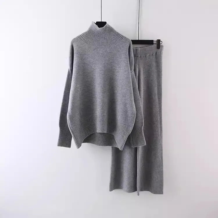 Women's beige acrylic long-sleeve sweater and wide-leg trousers two-piece casual set.