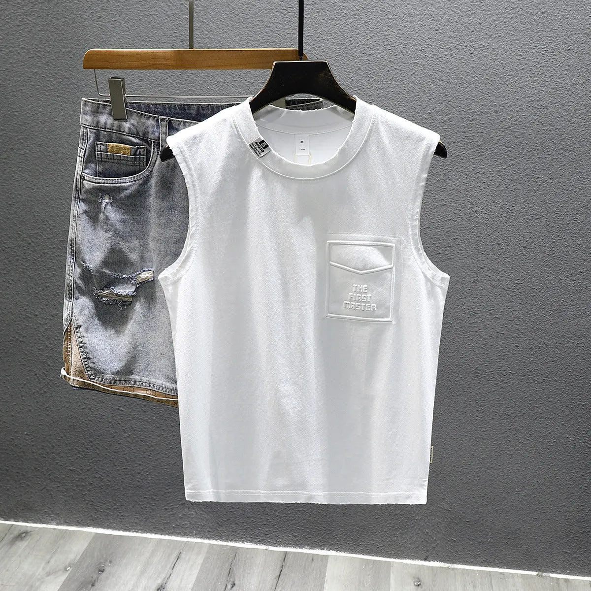 Cotton sleeveless t-shirt in loose fit with straight hem design in black or white colours