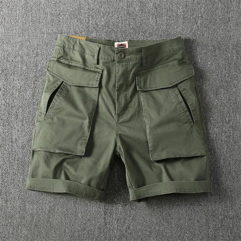 Men's straight-leg cotton cargo shorts with stretch in army green, shown with multiple pockets.