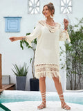Apricot-coloured women's long hand-crocheted beach dress with a lining, shown as a swimsuit cover-up.