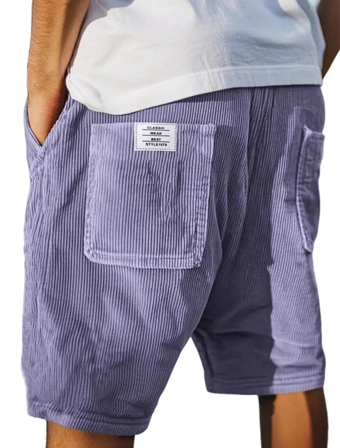 Men's grey corduroy shorts with multiple pockets and straight-leg cut on a neutral background.