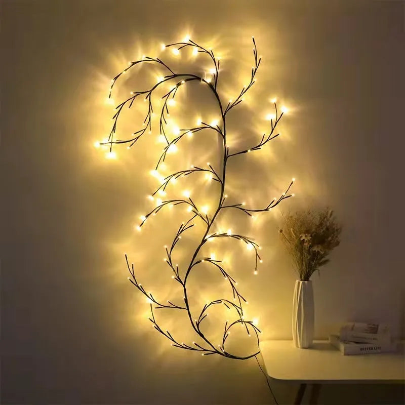 Flexible LED vine light garland with warm white lights on textured birch-bark branches, shaped decoratively.