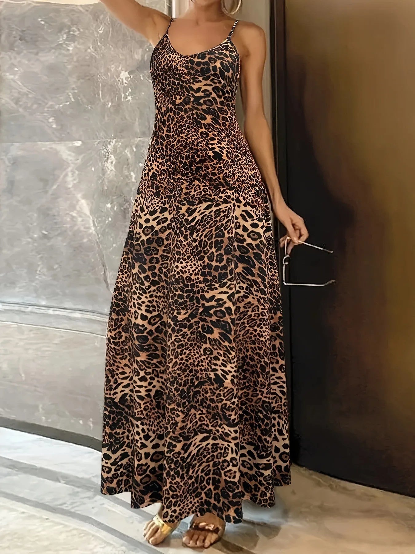 Dark brown leopard print sleeveless dress with round neck and mid waist hip skirt design