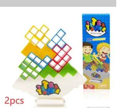 Colourful plastic balance stacking game with blocks, chassis, and base on a table