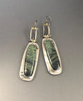 Geometric circular alloy earrings with grey and white marble pattern measuring 20mm diameter