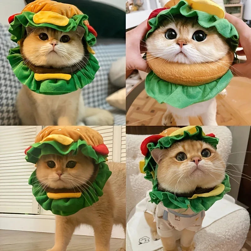 A cat wearing a soft cotton cartoon hamburger headdress with an adjustable neck strap.