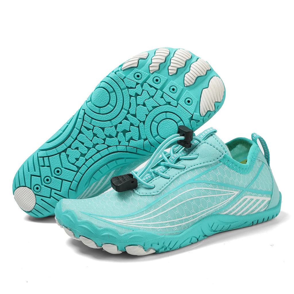 Children's black quick-drying water shoes with a non-slip rubber sole and elastic band.