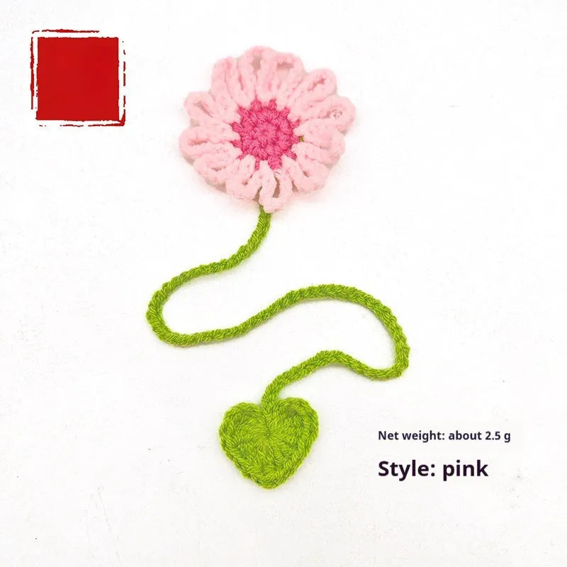Hand-crocheted wool bookmark with daisy design on flexible wire in multiple colour options