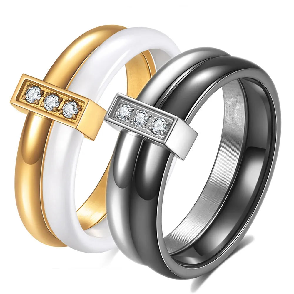 Ceramic women's ring with 6mm zirconium inlay in geometric design, available in steel black or gold white finishes