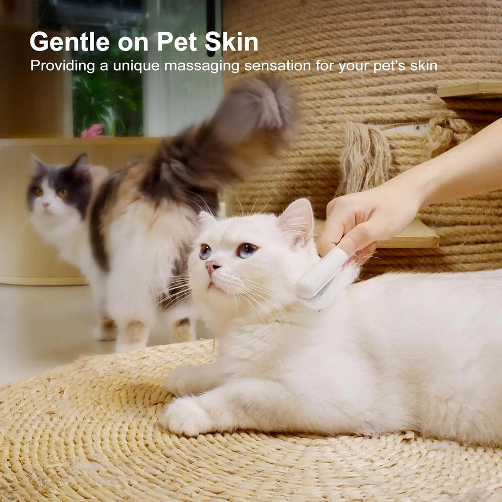 Cat comb with rounded stainless steel teeth and ergonomic handle on white background
