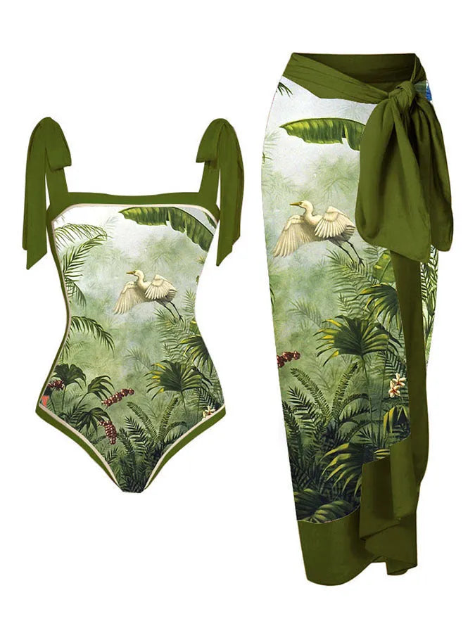 Women's two-piece floral printed polyester swimsuit with matching hip skirt in conservative style