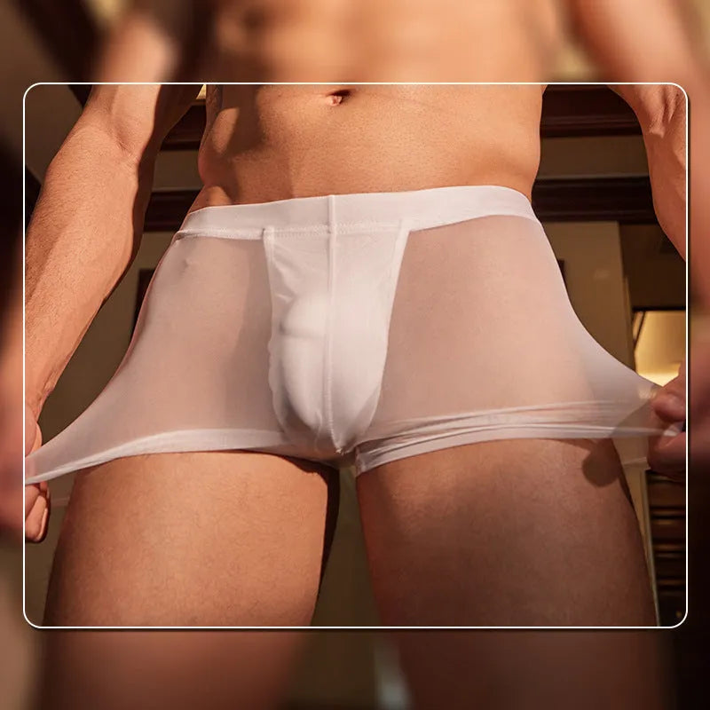Men's black and white ultra-thin nylon boxer briefs laid flat.