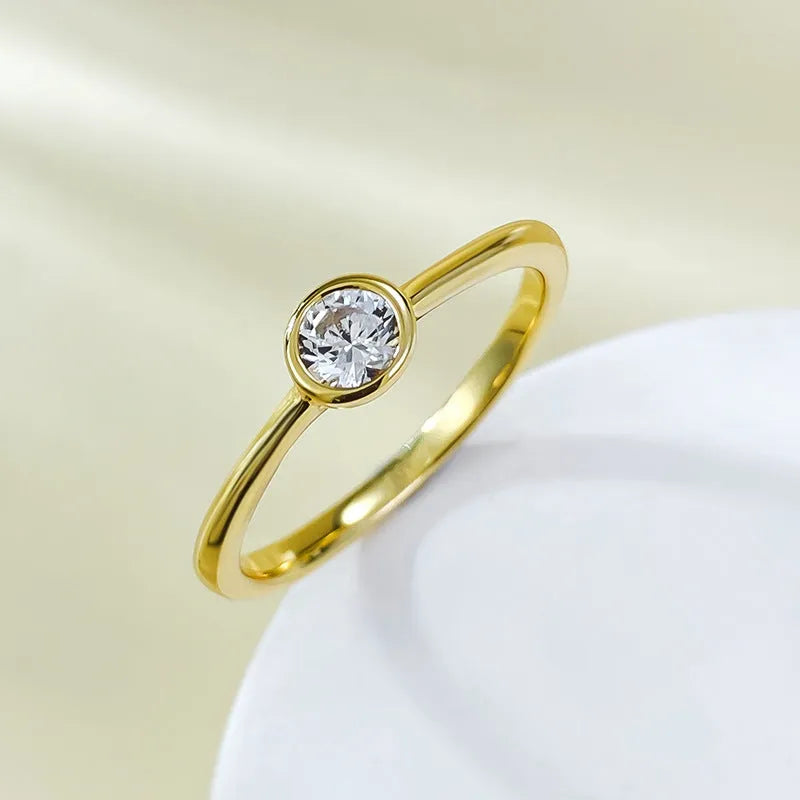 Minimalist silver crown ring with line design in gold or platinum finish on a size guide