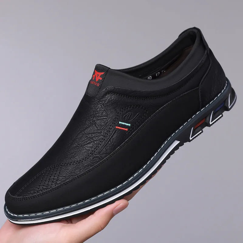 Men's black casual leather shoes with a rubber sole and leather toe cap.