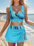 Split swimsuit for women in halter bikini style with skirt, peacock blue colour, polyester fabric.