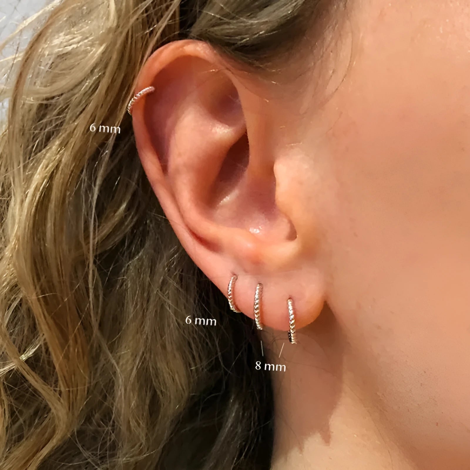 Sterling silver twisted hipster earrings in geometric round design with gold or platinum plating