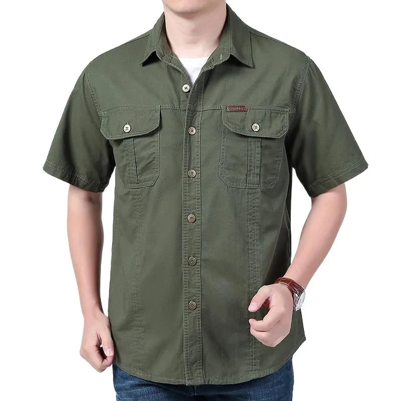 Men's cotton short sleeve loose fit cardigan shirt in dark blue on a model, summer workwear style