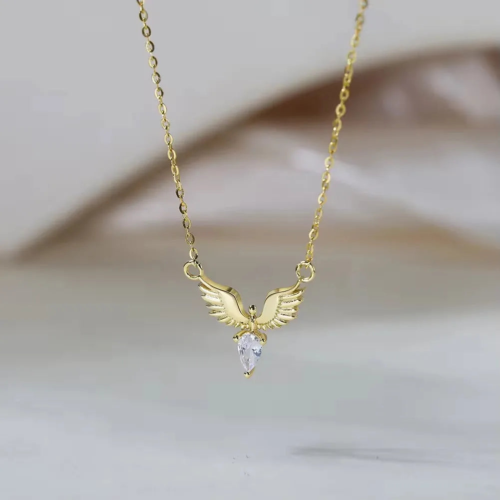 Sterling silver eagle pendant necklace on an adjustable O-ring chain with white gold or yellow gold finish.