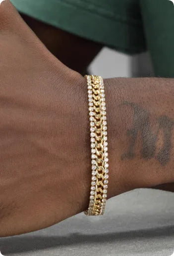 Gold titanium steel tennis bracelet with artificial gemstone inlay on wrist