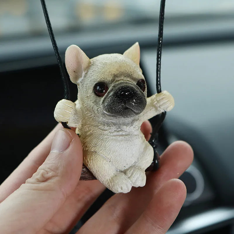 Resin cartoon bulldog car hanging ornament for rearview mirror in black, white, or yellow.