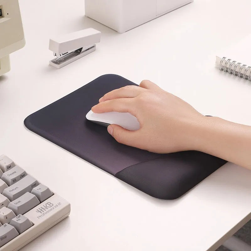 Square silicone gel wrist rest mouse pad in black, blue, pink or purple colours measuring 250x180mm