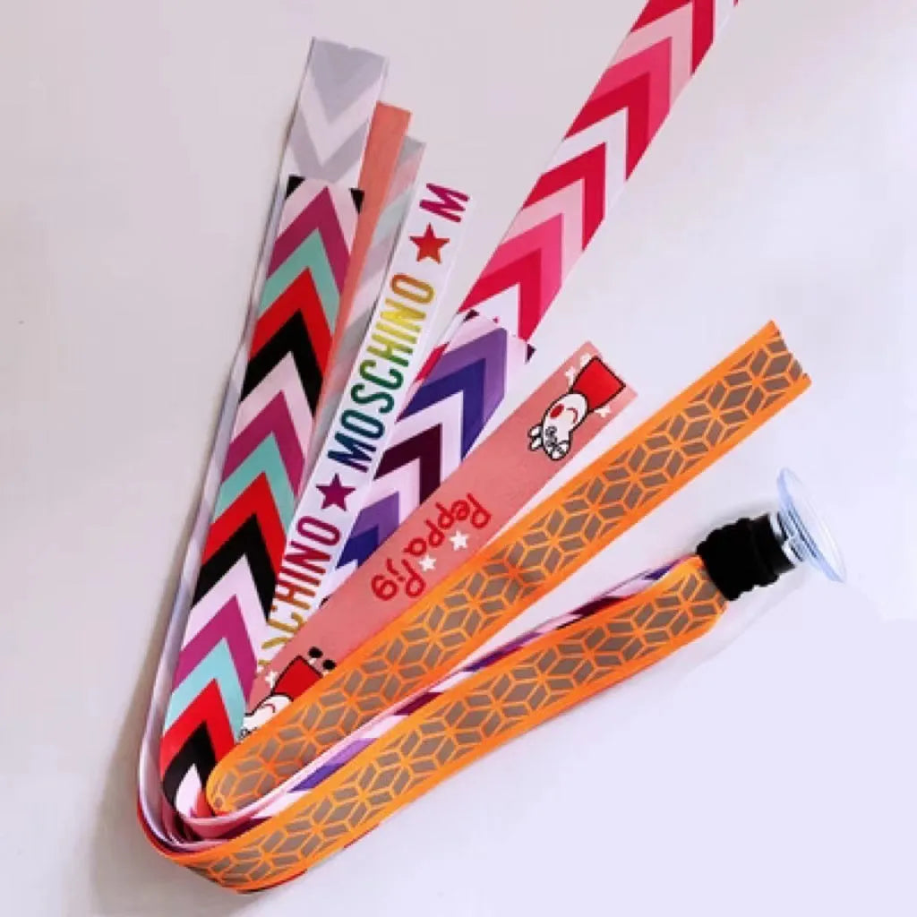 Colourful decorative ribbon streamers attached to a children safety helmet for skating or skiing