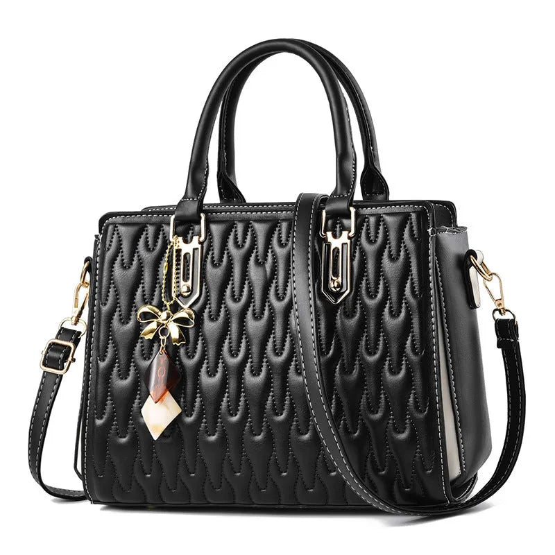 Women's messenger shoulder bag in gold colour showing outer pocket sandwich design and organised interior compartments