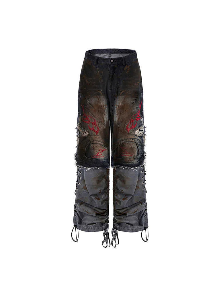Men's retro denim jeans with detachable trouser legs in a wide leg, loose fit style.