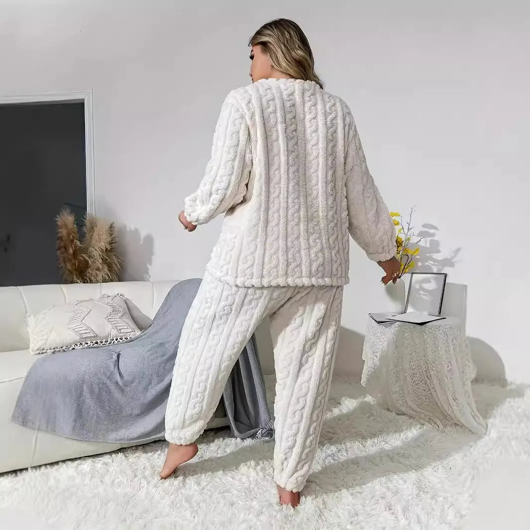 Women's creamy white polyester two-piece lounge set with long sleeve top and trousers on a hanger.