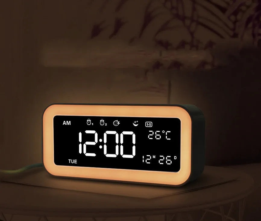 Blue rectangular LED atmosphere light alarm clock with digital display on wooden surface