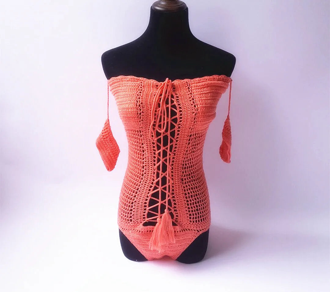Women's off-the-shoulder one-piece swimsuit in light pink on a mannequin