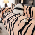 Zebra pattern flannel sofa cover on furniture in caramel colour with matching pillowcase