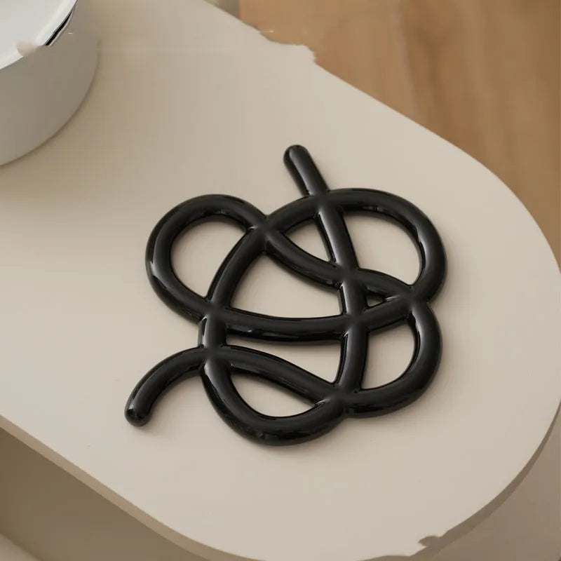 Ceramic heat proof mat with irregular shape design in solid colour options