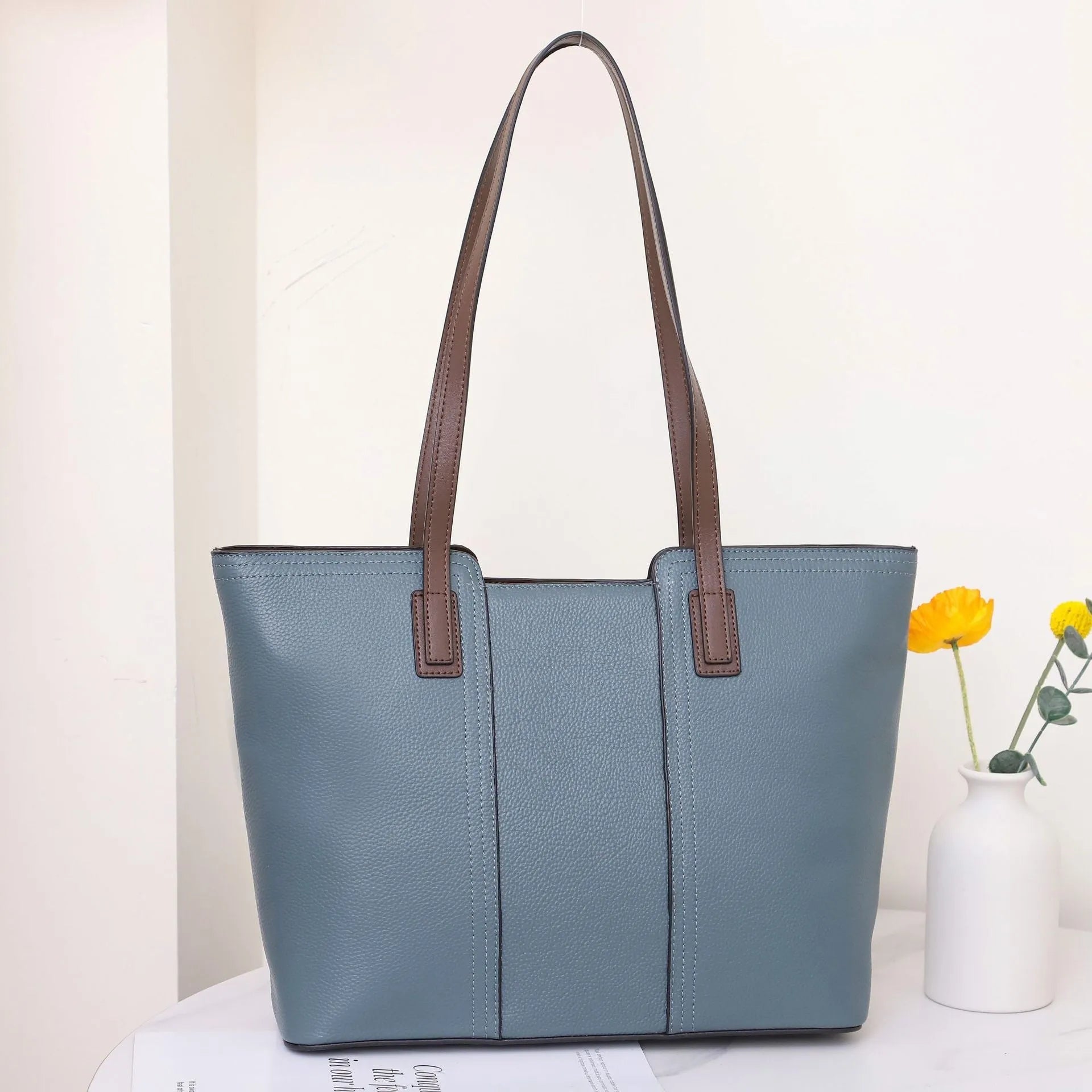Women's genuine leather commuter shoulder bag in khaki colour with sandwich pocket and internal organisation
