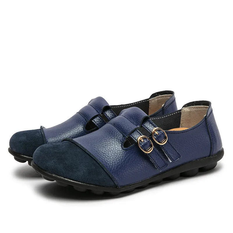 Women's casual flat shoes with Velcro fastening in black, showing round toe and beef tendon sole