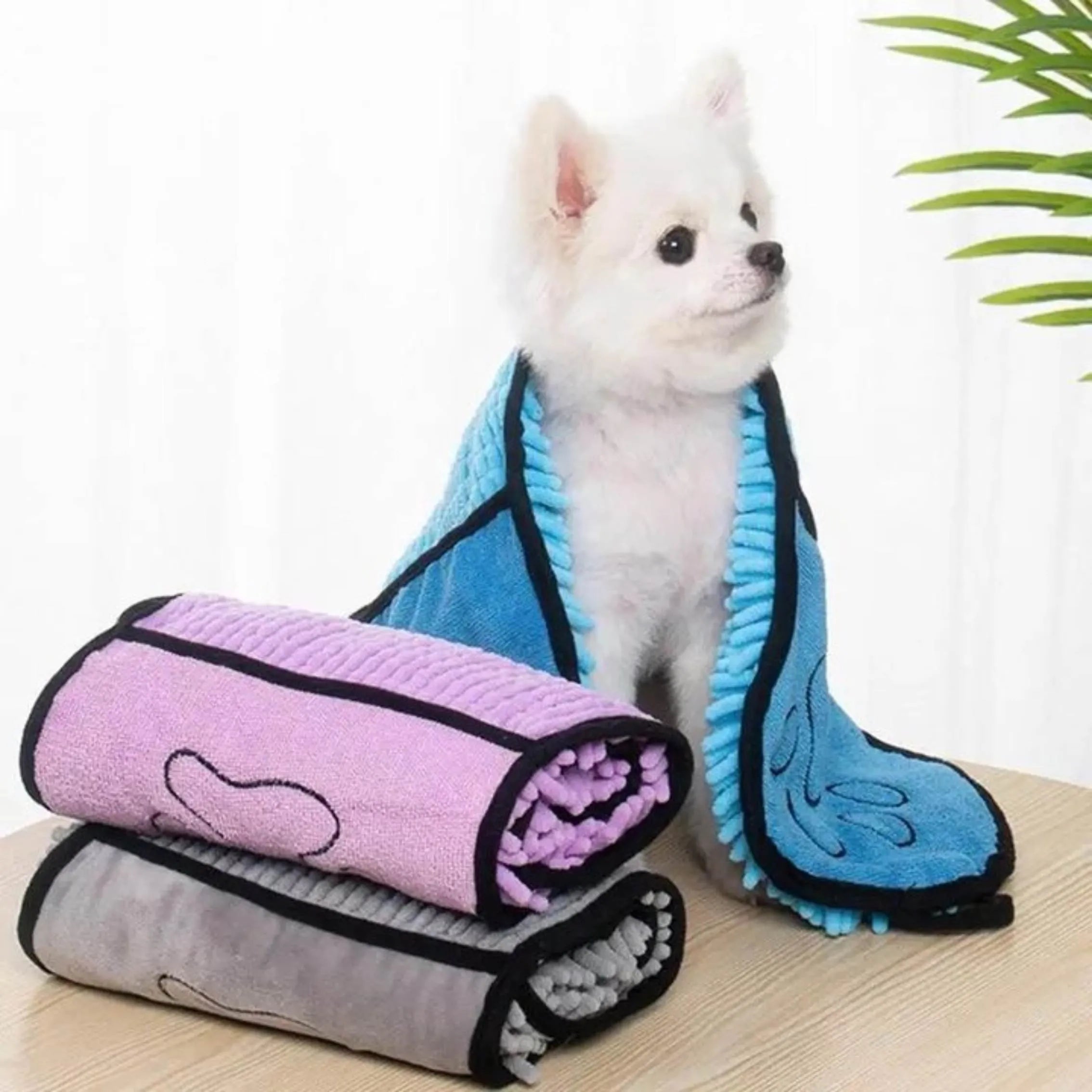 Blue pet bathrobe towel for drying dogs and cats, shown flat at 62cm by 23cm.