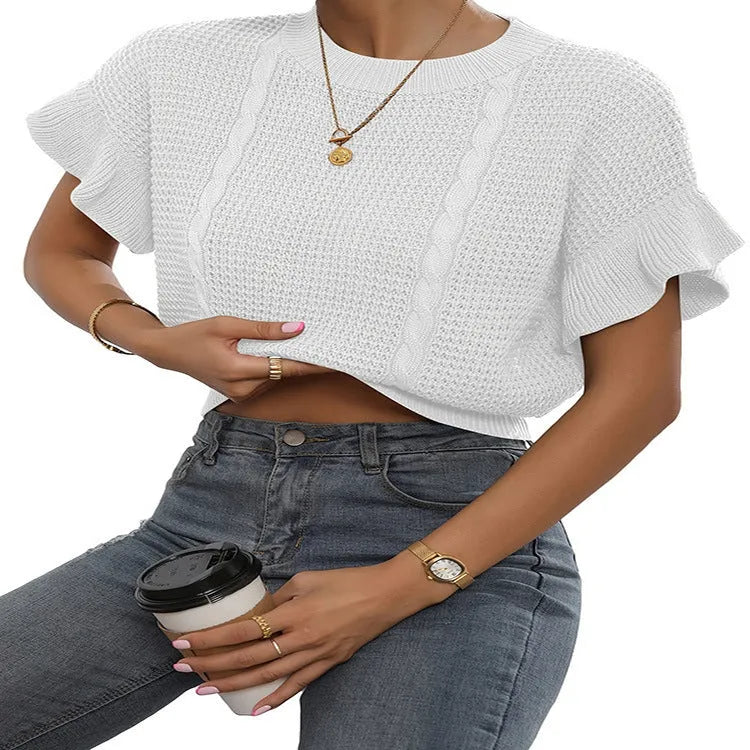 White knitted pullover sweater with ruffled short sleeves created from twisted string, shown in a loose fit.