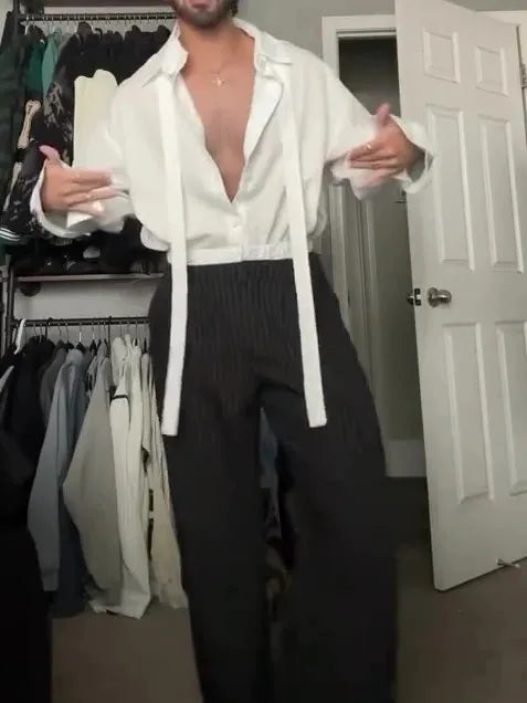 White oversized tie-front shirt with relaxed fit, open collar, and regular-length cut on a plain background
