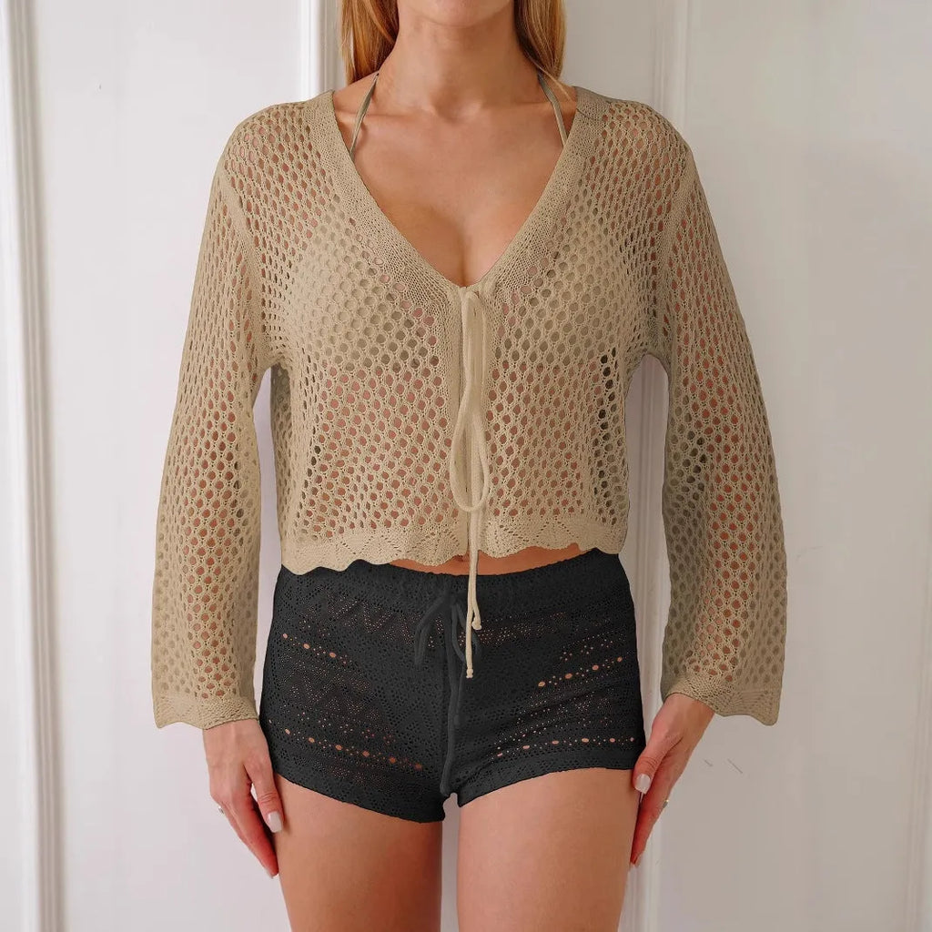 Women's apricot hollow woven cardigan blouse with bell sleeves laid flat